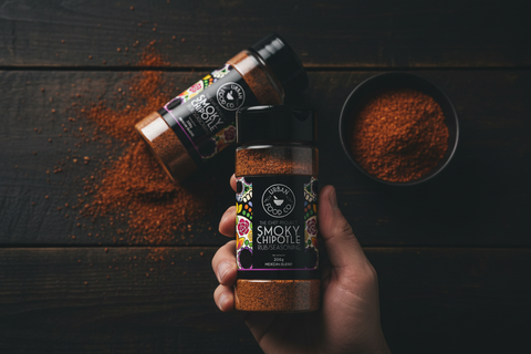Dark moody overhead shot of Urban Food Co. Smoky Chipotle shakers